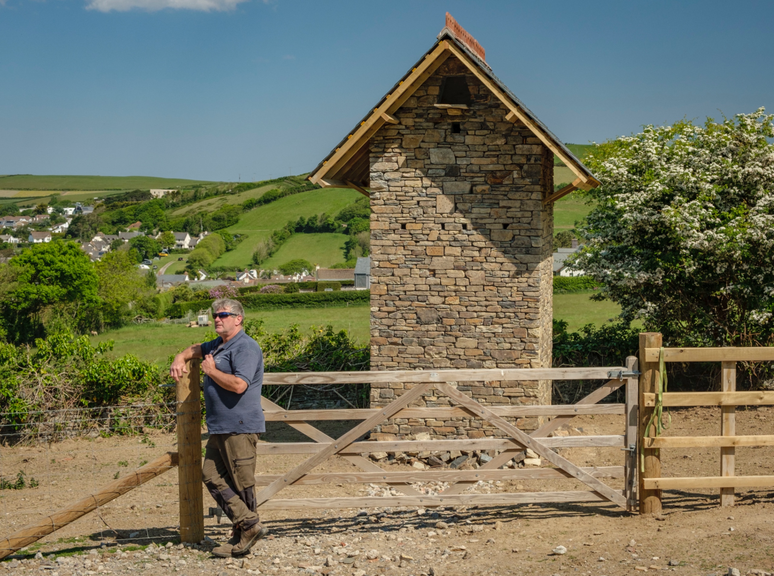 Maddocks Owlery with Simon Maddocks stood infront.